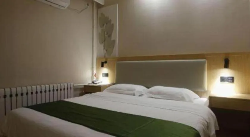 Bed in GreenTree Inn Liaoning Province Huludao City Xingcheng Shoushan Express Hotel