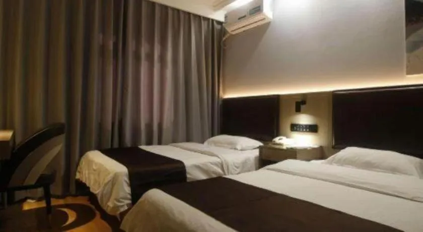 Bed in GreenTree Inn Liaoning Province Huludao City Xingcheng Shoushan Express Hotel