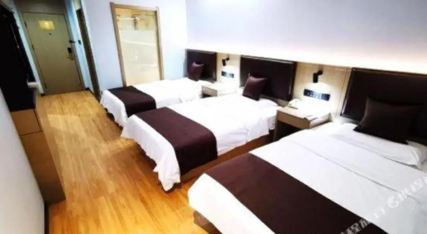 Bed in GreenTree Inn Liaoning Province Huludao City Xingcheng Shoushan Express Hotel