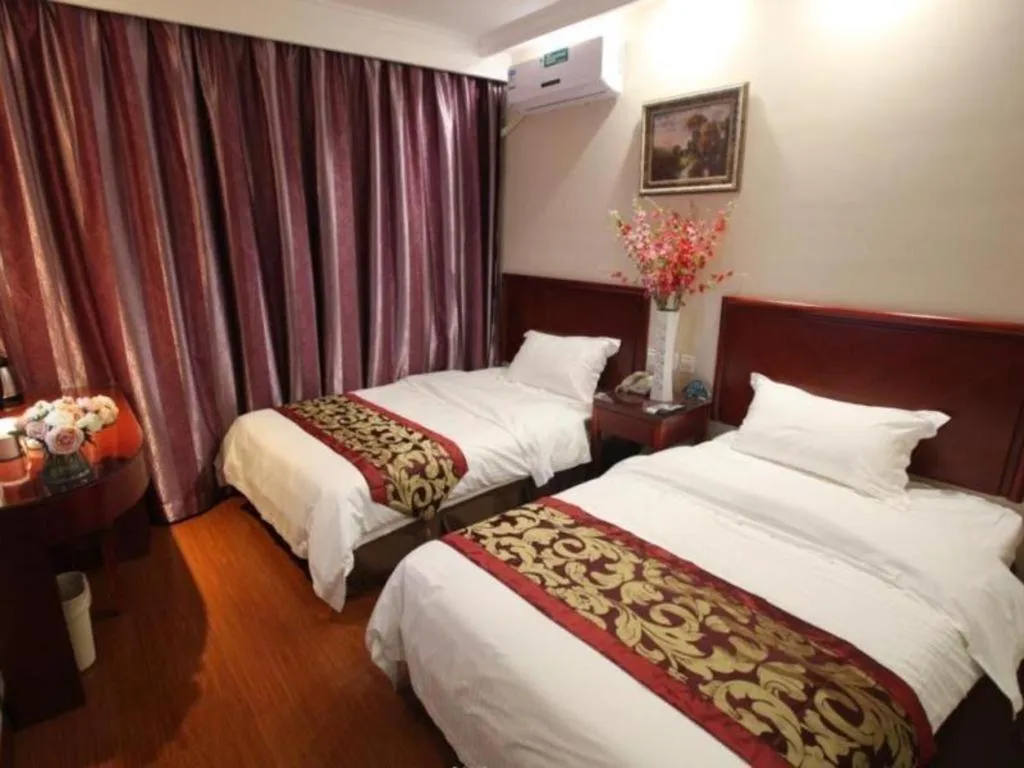 Bed in GreenTree Inn Liaoning Province Huludao City Xingcheng Shoushan Express Hotel