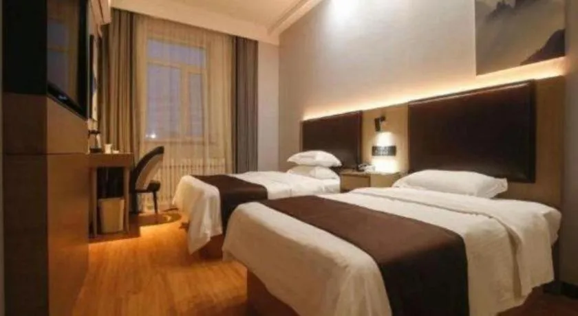 Bed in GreenTree Inn Liaoning Province Huludao City Xingcheng Shoushan Express Hotel