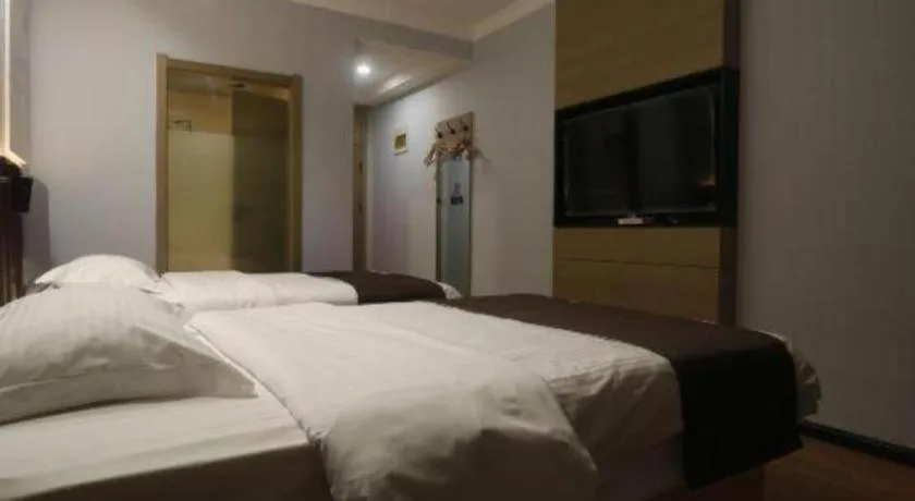 Bed in GreenTree Inn Liaoning Province Huludao City Xingcheng Shoushan Express Hotel