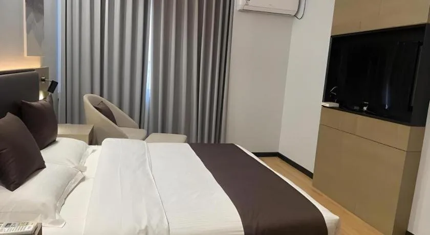 Bed in GreenTree Inn Liaoning Province Huludao City Xingcheng Shoushan Express Hotel