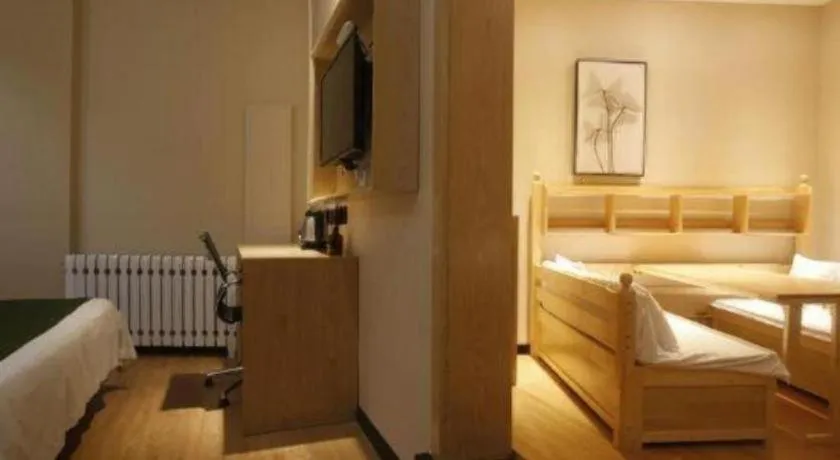 Bed in GreenTree Inn Liaoning Province Huludao City Xingcheng Shoushan Express Hotel