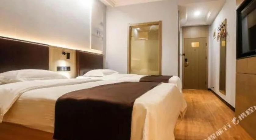 Bed in GreenTree Inn Liaoning Province Huludao City Xingcheng Shoushan Express Hotel