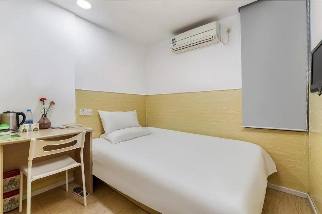 Bed in Hi Inn Guangzhou Gangding Metro Station