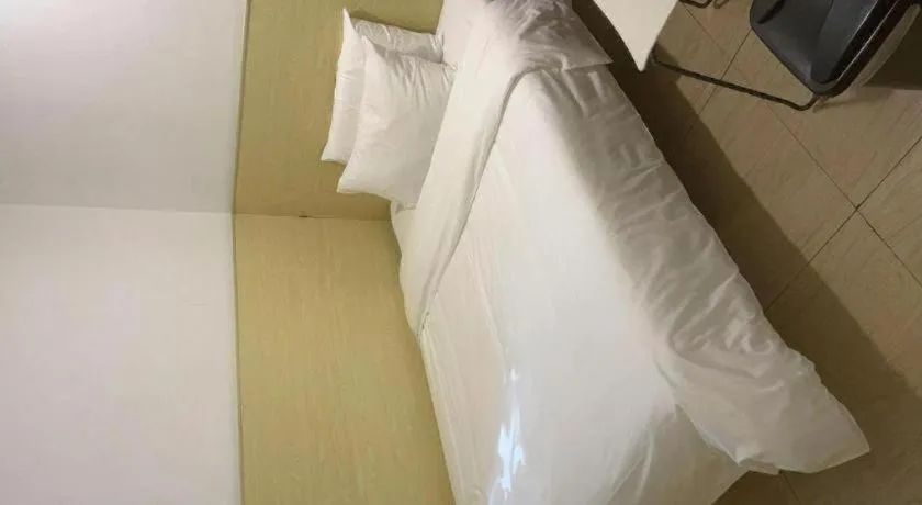 Bed in Hi Inn Guangzhou Gangding Metro Station