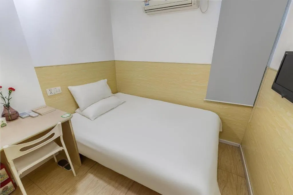 Bed in Hi Inn Guangzhou Gangding Metro Station