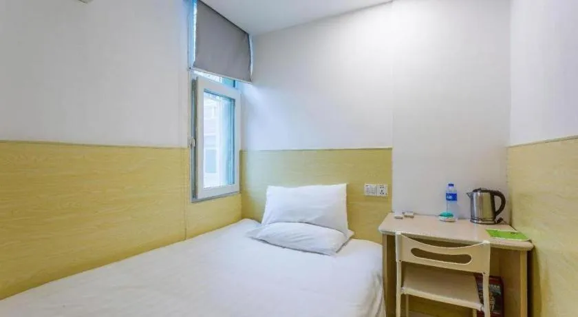 Bed in Hi Inn Guangzhou Gangding Metro Station