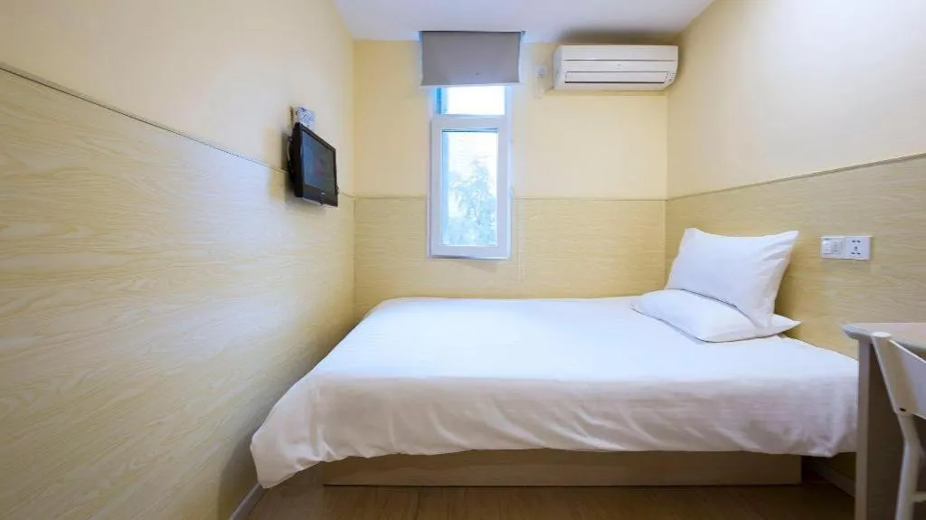 Bed in Hi Inn Guangzhou Gangding Metro Station