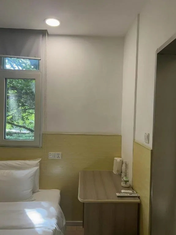 Bed in Hi Inn Guangzhou Gangding Metro Station