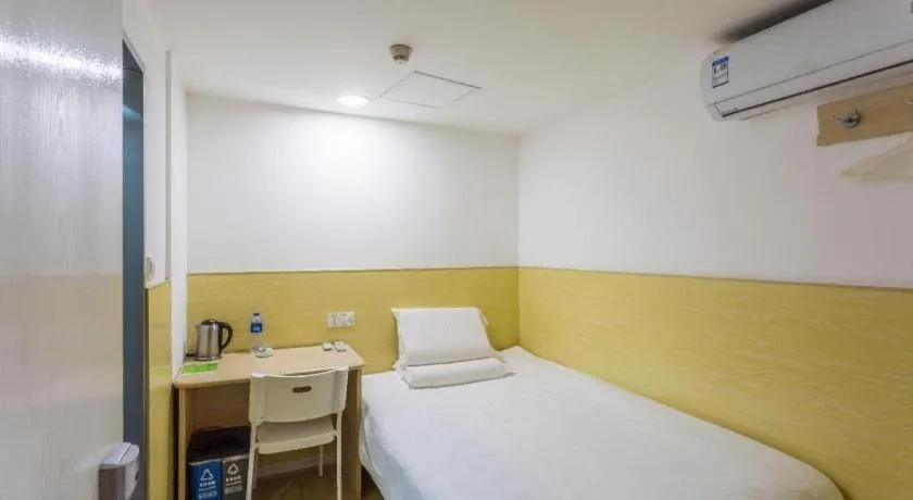 Bed in Hi Inn Guangzhou Gangding Metro Station