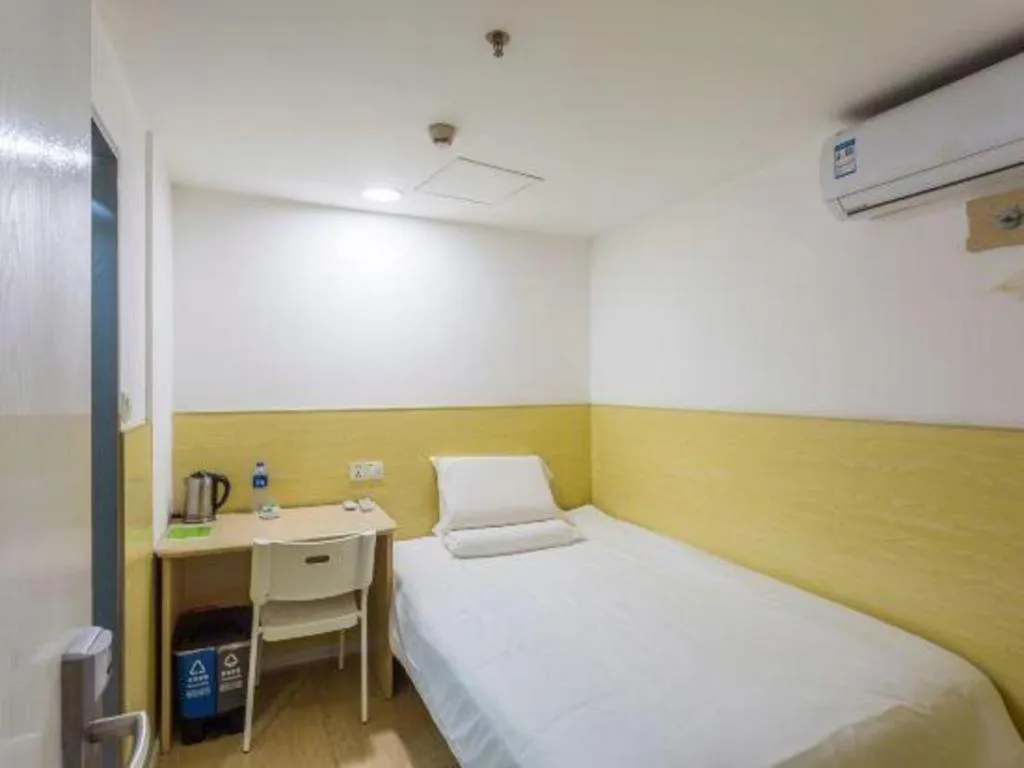 Bed in Hi Inn Guangzhou Gangding Metro Station