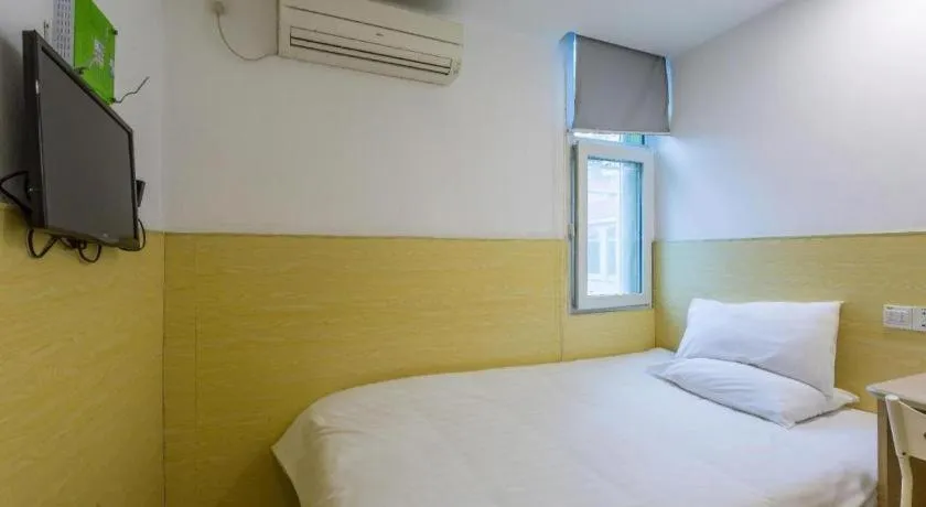 Bed in Hi Inn Guangzhou Gangding Metro Station