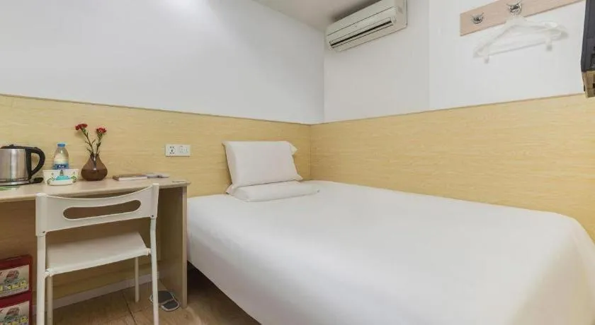 Bed in Hi Inn Guangzhou Gangding Metro Station