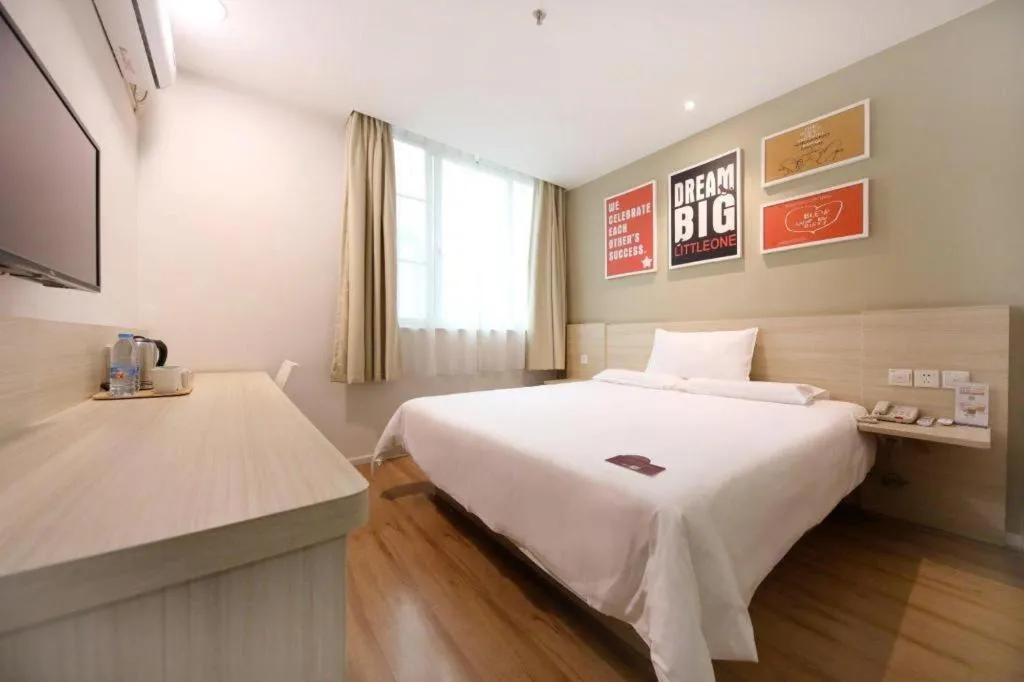 Bed in Hi Inn Guangzhou Gangding Metro Station