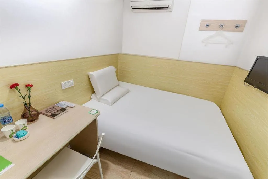 Bed in Hi Inn Guangzhou Gangding Metro Station