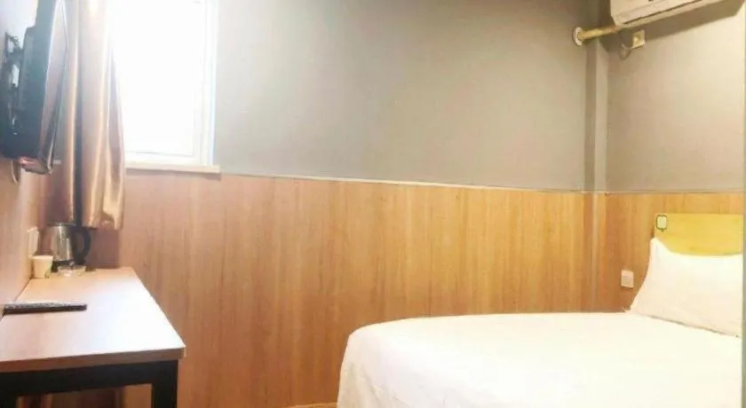 Bed in Hi Inn Guangzhou Gangding Metro Station