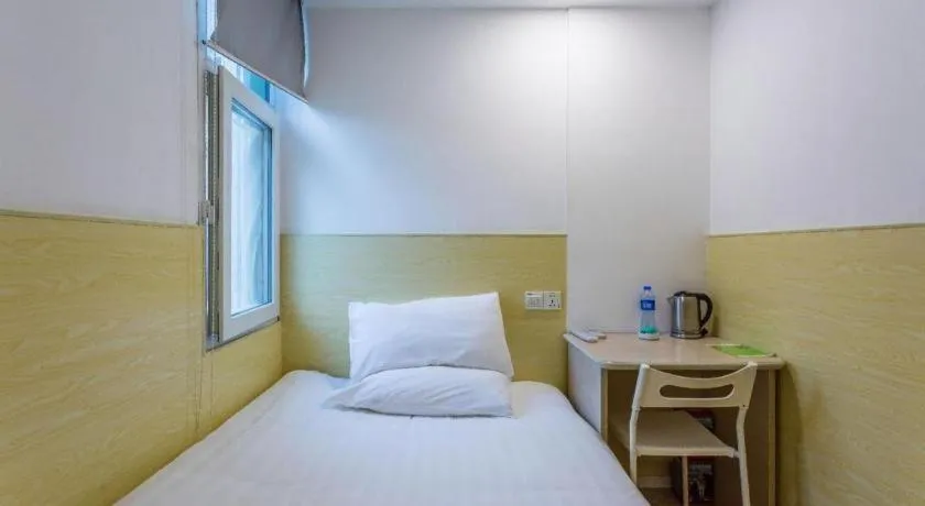 Bed in Hi Inn Guangzhou Gangding Metro Station