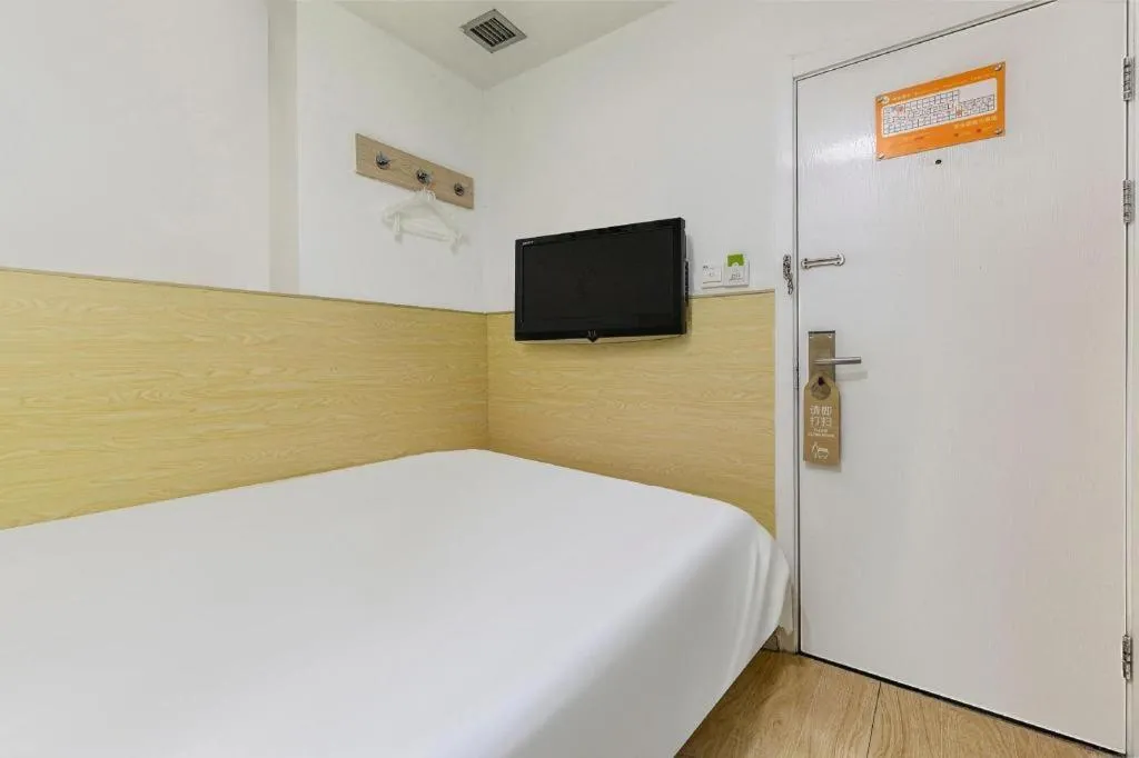 Bed in Hi Inn Guangzhou Gangding Metro Station