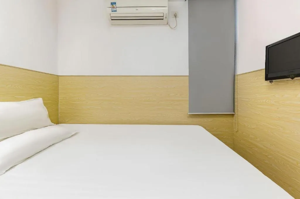 Bed in Hi Inn Guangzhou Gangding Metro Station