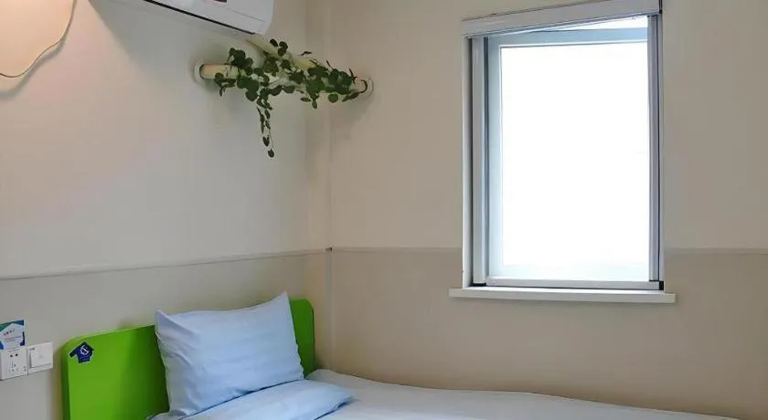 Bed in Hi Inn Guangzhou Gangding Metro Station