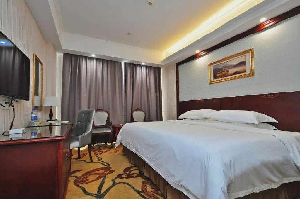 Bed in Vienna Classic Hotel Ningbo Xiangshan Wanda