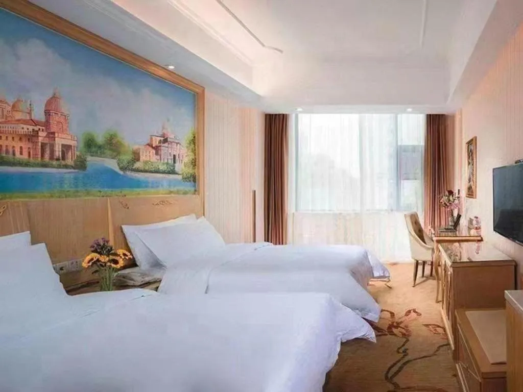 Bed in Vienna Classic Hotel Ningbo Xiangshan Wanda