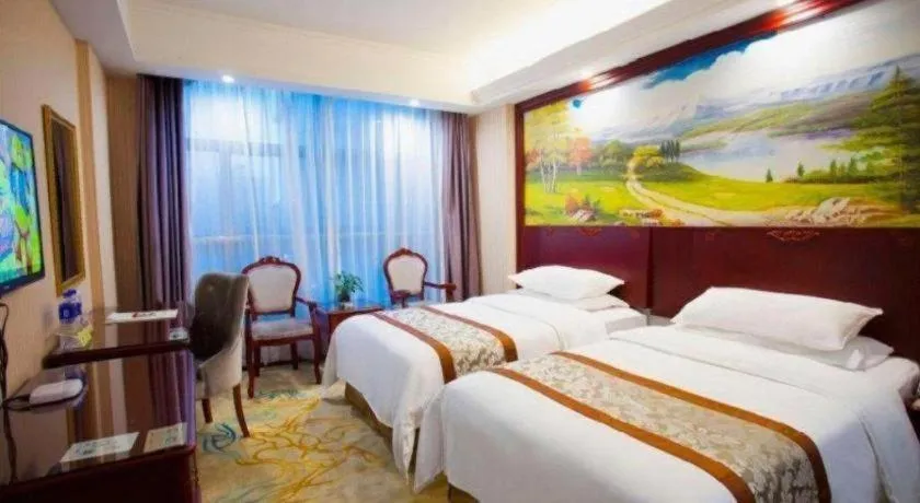 Bed in Vienna Classic Hotel Ningbo Xiangshan Wanda