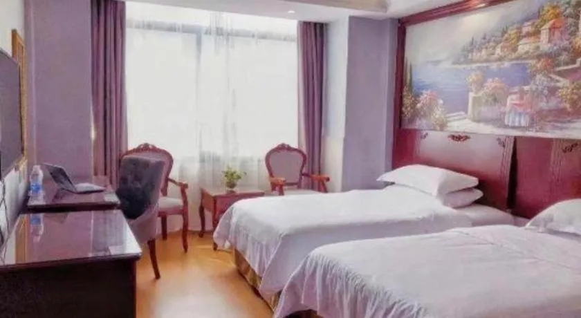 Bed in Vienna Classic Hotel Ningbo Xiangshan Wanda