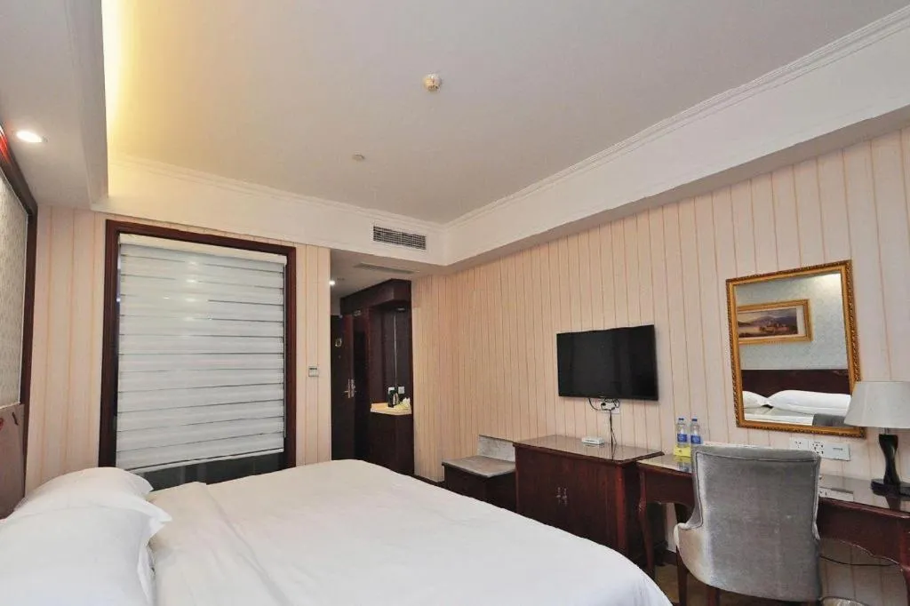 Bed in Vienna Classic Hotel Ningbo Xiangshan Wanda