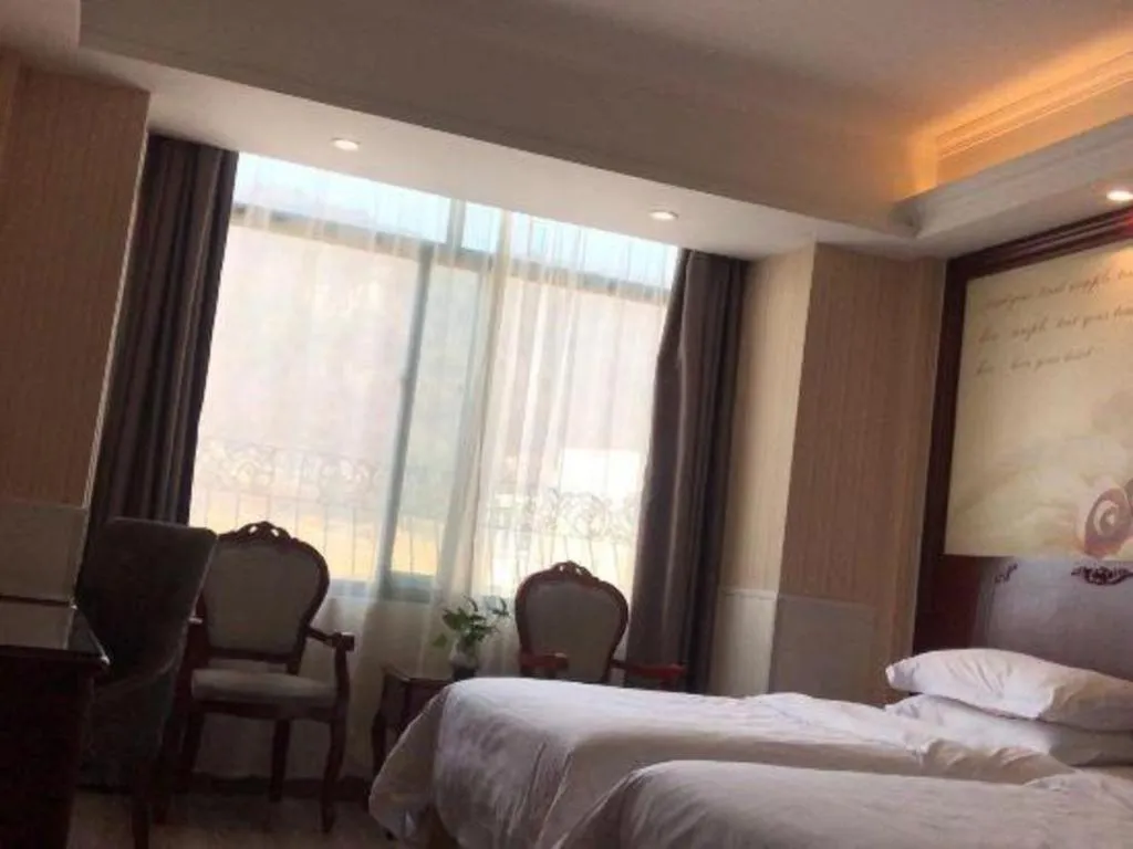 Bed in Vienna Classic Hotel Ningbo Xiangshan Wanda