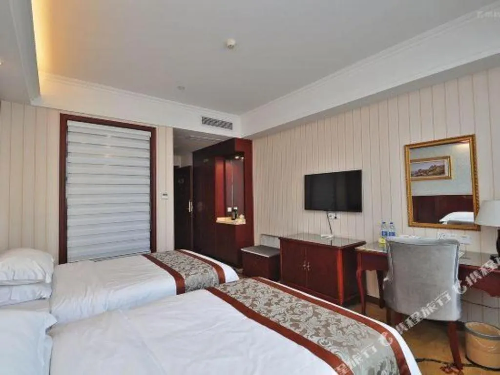 Bed in Vienna Classic Hotel Ningbo Xiangshan Wanda