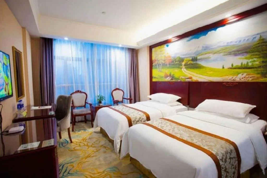 Bed in Vienna Classic Hotel Ningbo Xiangshan Wanda