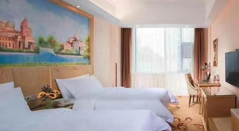 Bed in Vienna Classic Hotel Ningbo Xiangshan Wanda