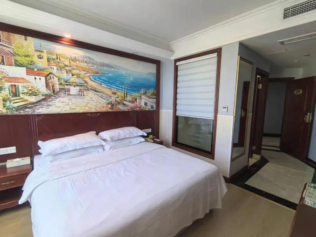 Bed in Vienna Classic Hotel Ningbo Xiangshan Wanda