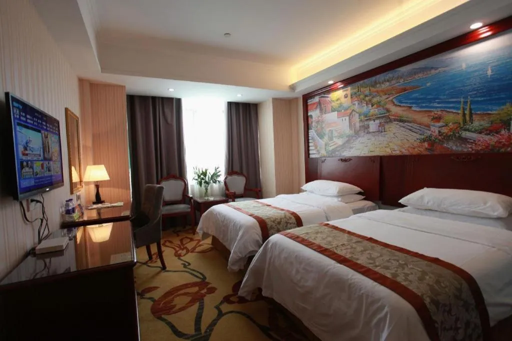 Bed in Vienna Classic Hotel Ningbo Xiangshan Wanda