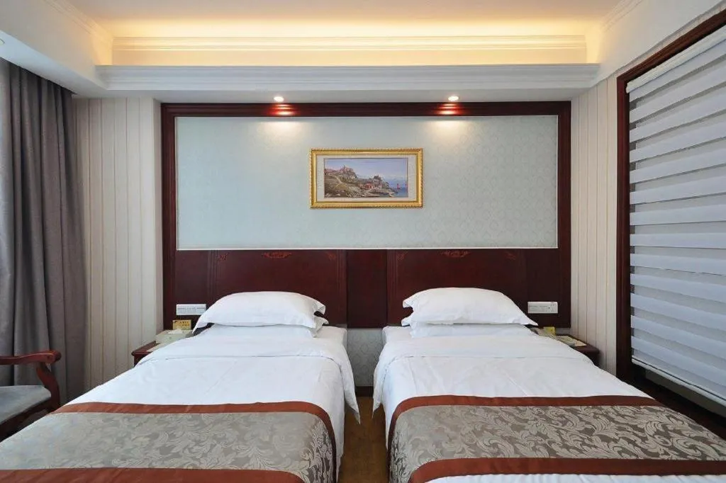 Bed in Vienna Classic Hotel Ningbo Xiangshan Wanda