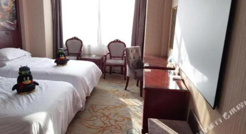 Bed in Vienna Classic Hotel Ningbo Xiangshan Wanda