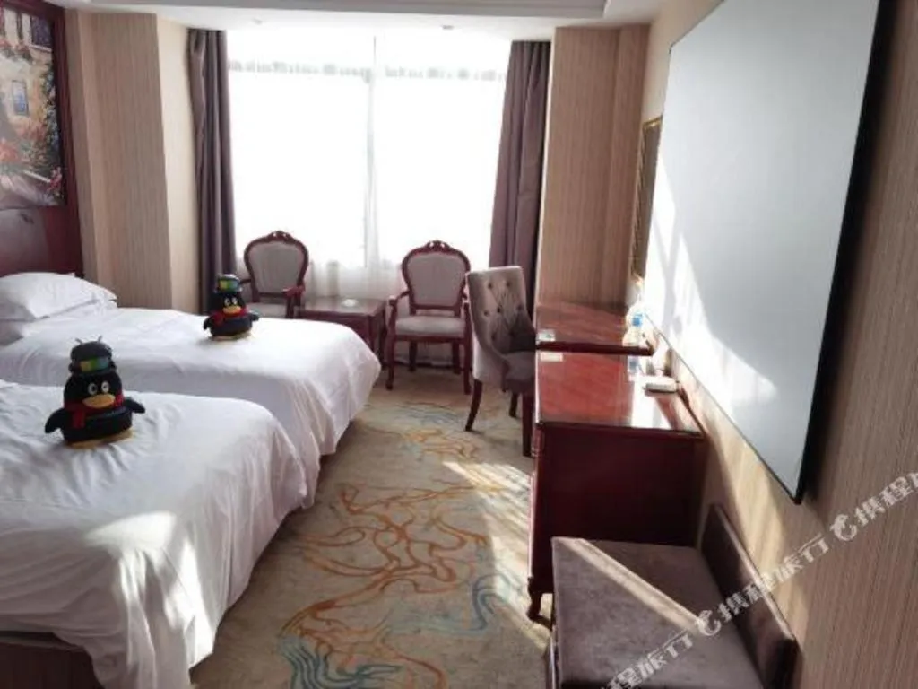 Bed in Vienna Classic Hotel Ningbo Xiangshan Wanda