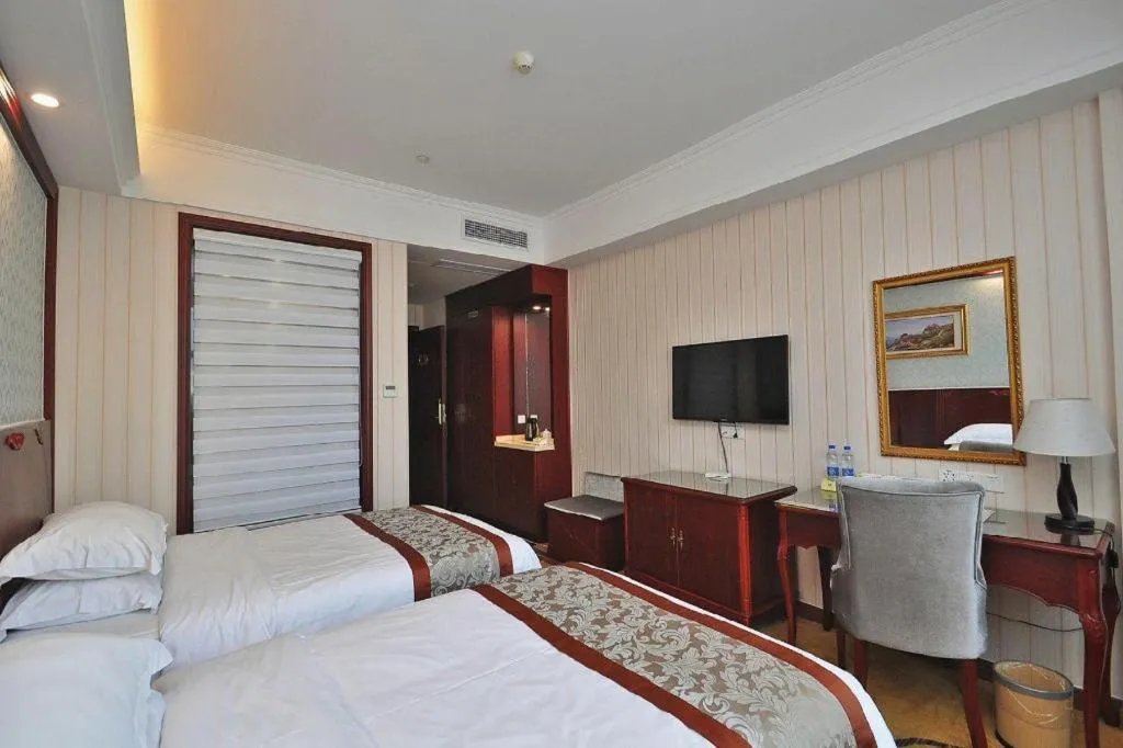 Bed in Vienna Classic Hotel Ningbo Xiangshan Wanda