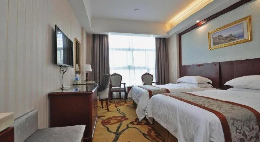 Bed in Vienna Classic Hotel Ningbo Xiangshan Wanda