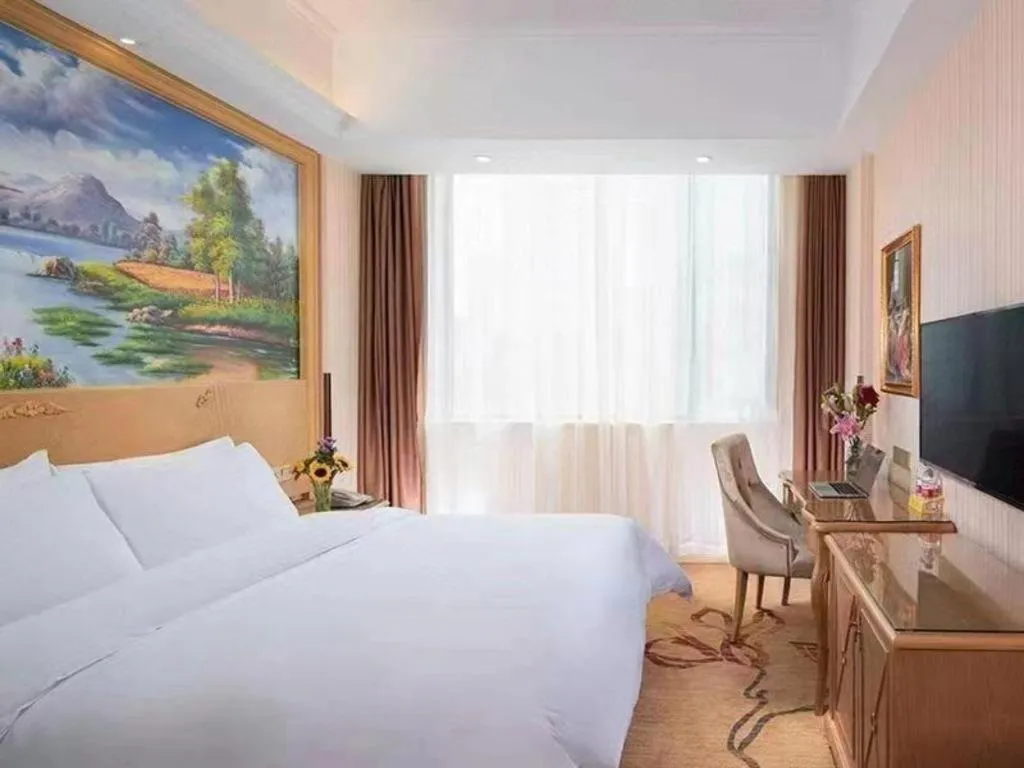 Bed in Vienna Classic Hotel Ningbo Xiangshan Wanda