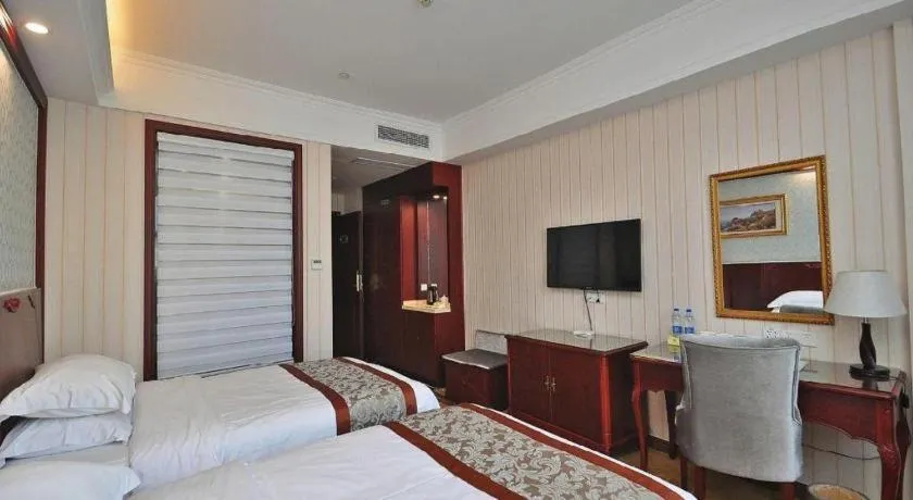 Bed in Vienna Classic Hotel Ningbo Xiangshan Wanda