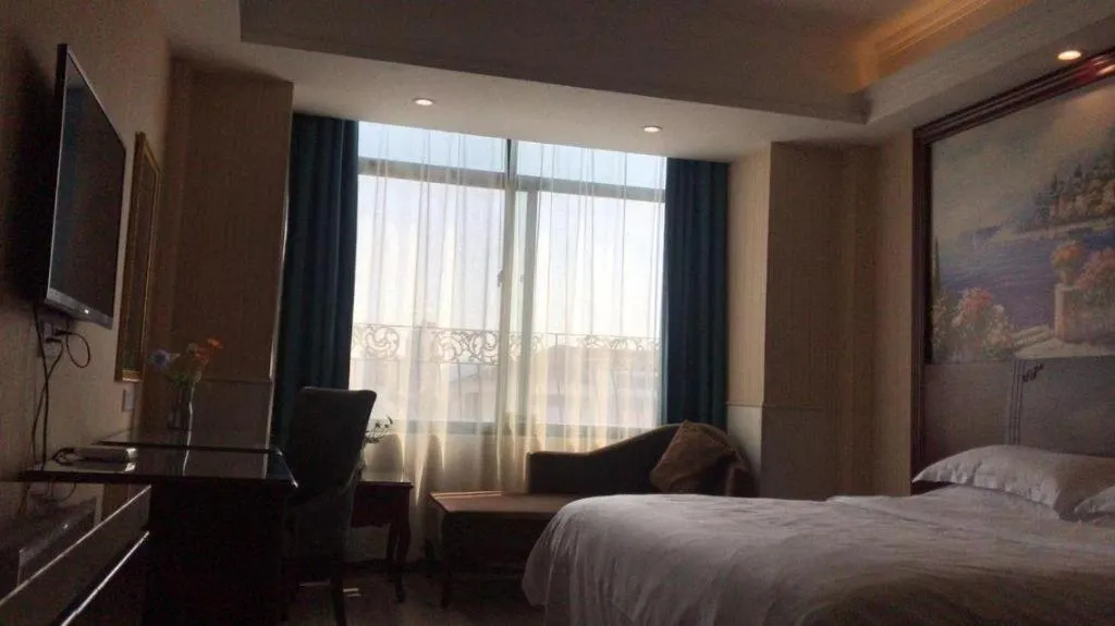 Bed in Vienna Classic Hotel Ningbo Xiangshan Wanda