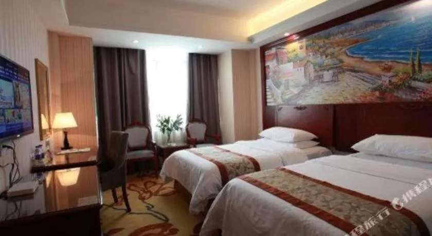 Bed in Vienna Classic Hotel Ningbo Xiangshan Wanda