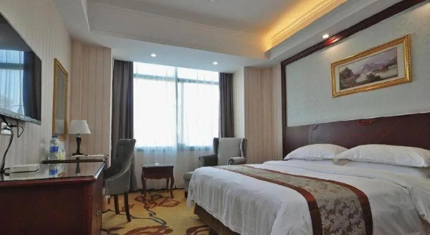 Bed in Vienna Classic Hotel Ningbo Xiangshan Wanda