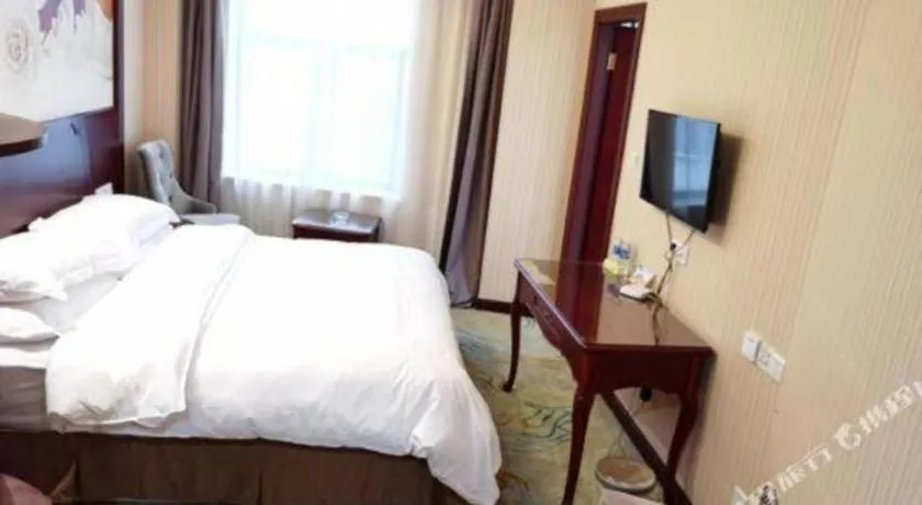 Bed in Vienna Classic Hotel Ningbo Xiangshan Wanda