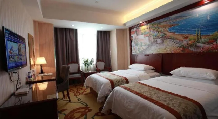 Bed in Vienna Classic Hotel Ningbo Xiangshan Wanda