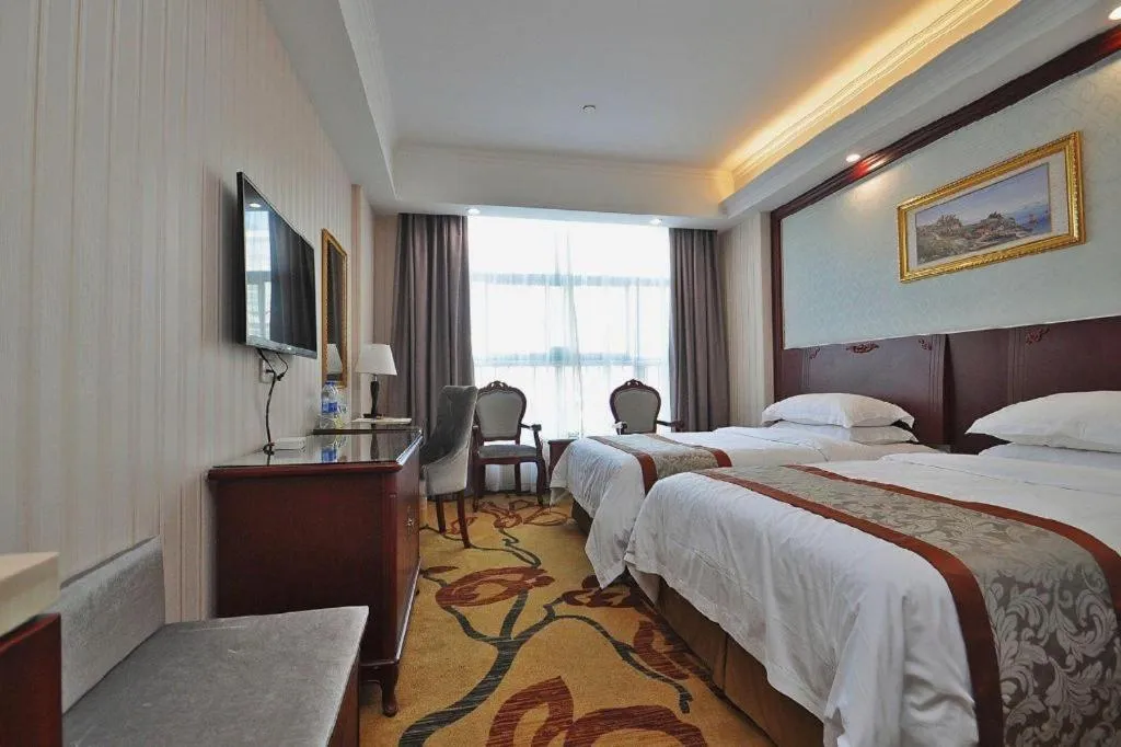 Bed in Vienna Classic Hotel Ningbo Xiangshan Wanda